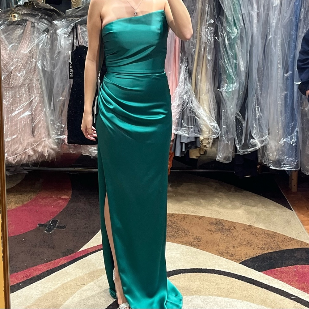 Never worn before size 4 Nicole Bakti Emerald Green Gown.